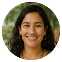 Circular profile picture of a person with dark hair and hoop earrings.