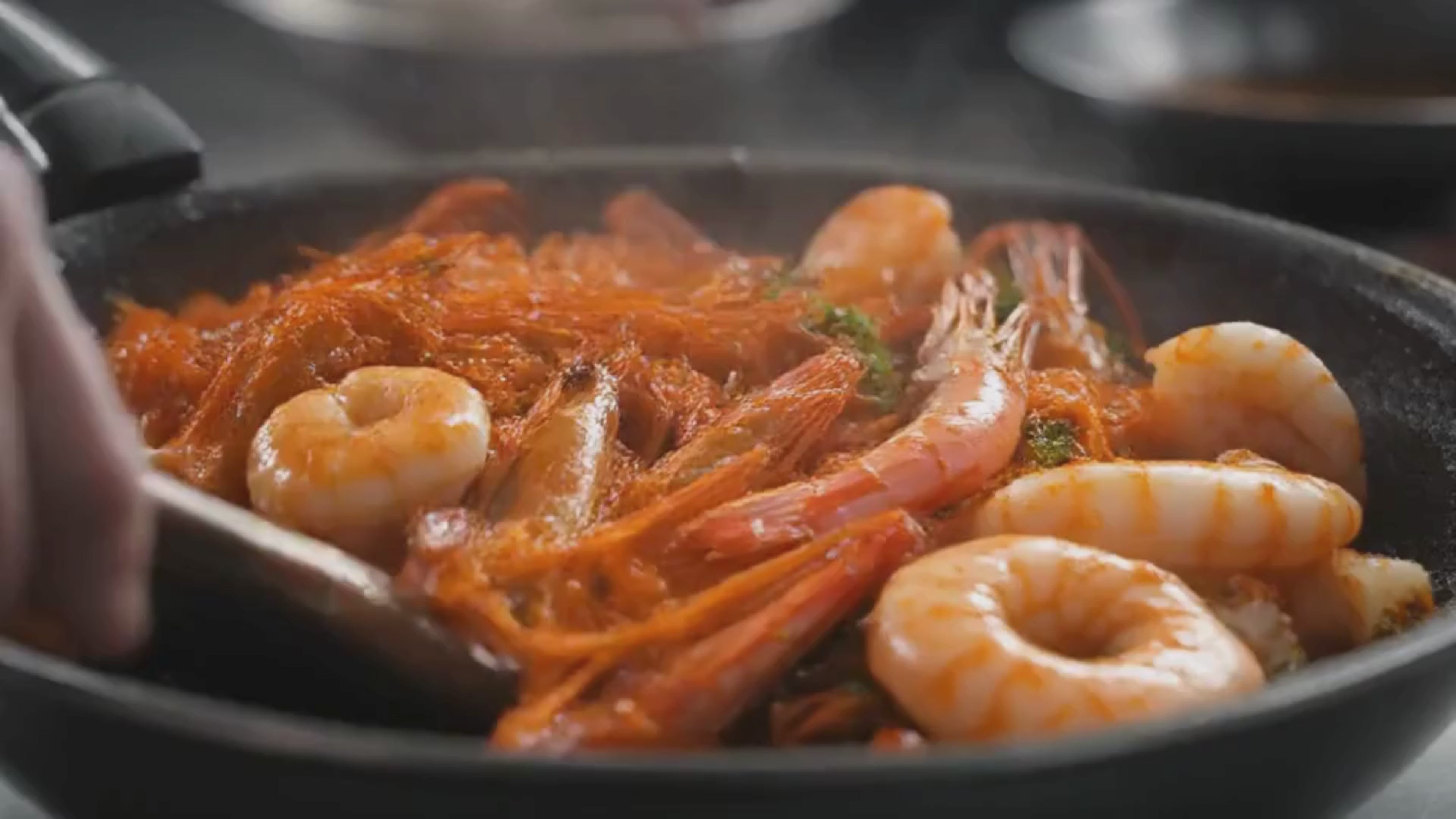 Video of different seafood being cooked.